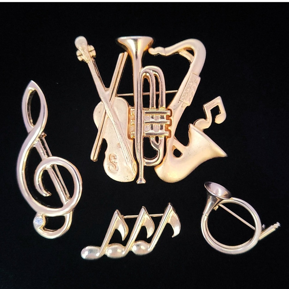 Lot of 4 Musical Brooches Gold Tone Treble Clef Note Saxophone Trumpet AJI Pins